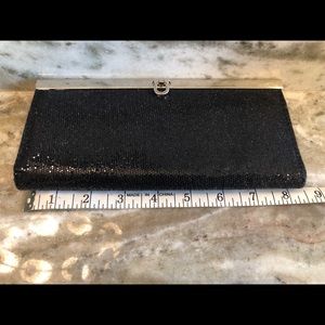 Small black Mundi shimmery clutch